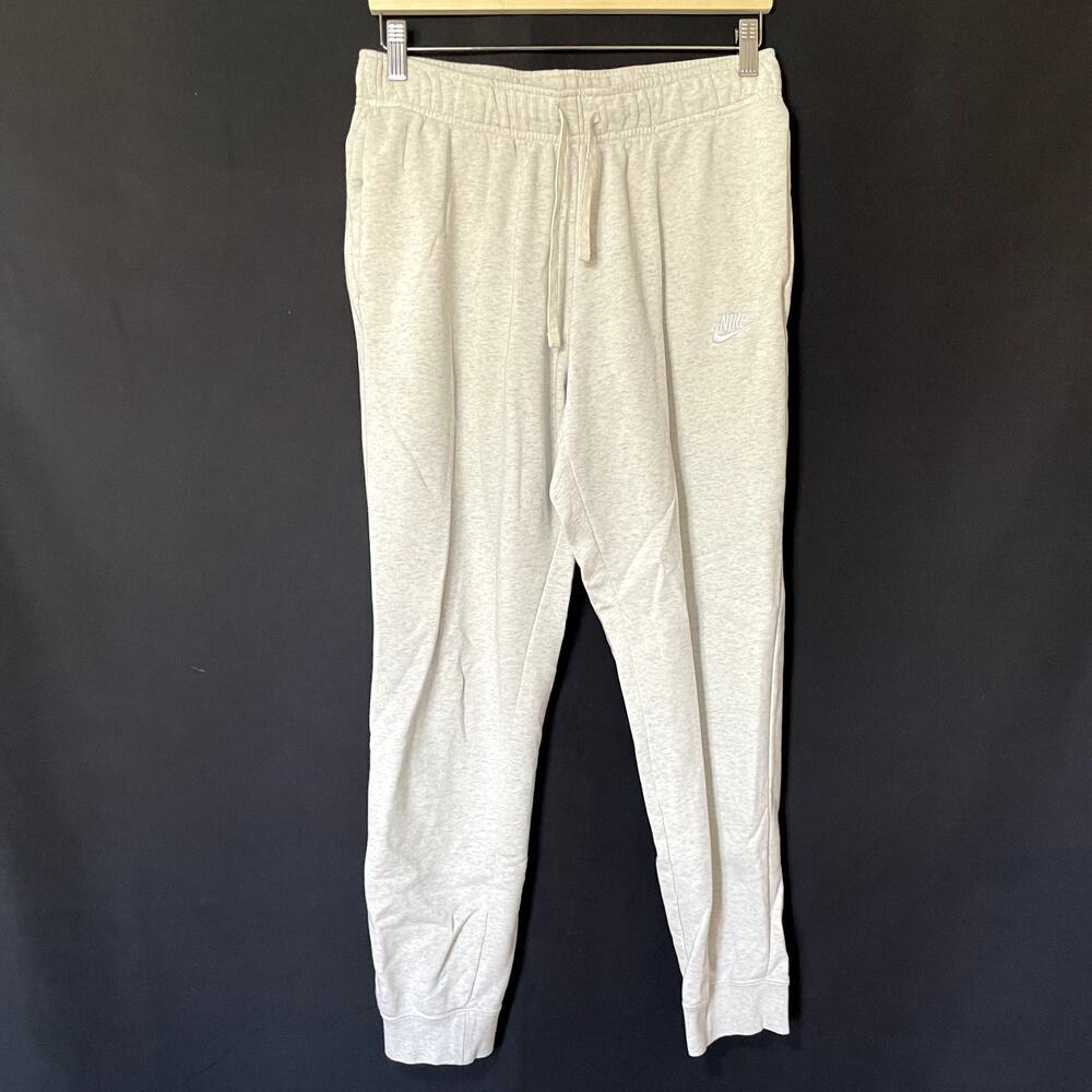 Nike cream white sweatpants pockets drawstring waist women's size medium pockets